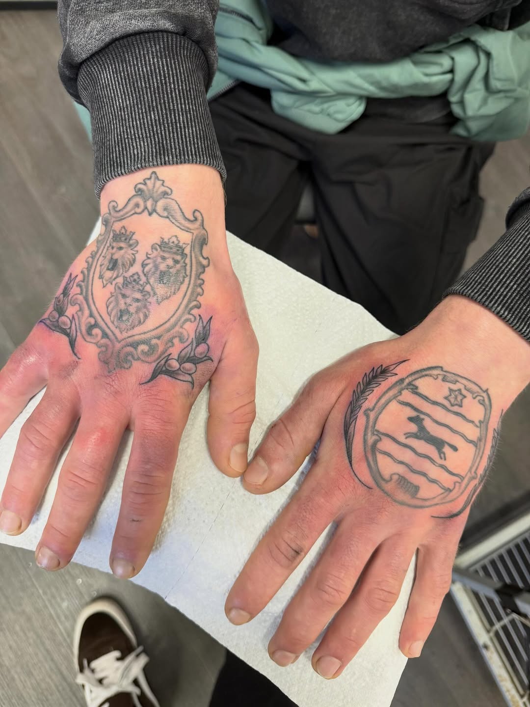 Wheat and Olive branches adding to existing hand tattoos. Center Hand tattoos not done by me #galway #galwaytattoo #hemmingtattoo #blackandgreytattoo #galwayireland