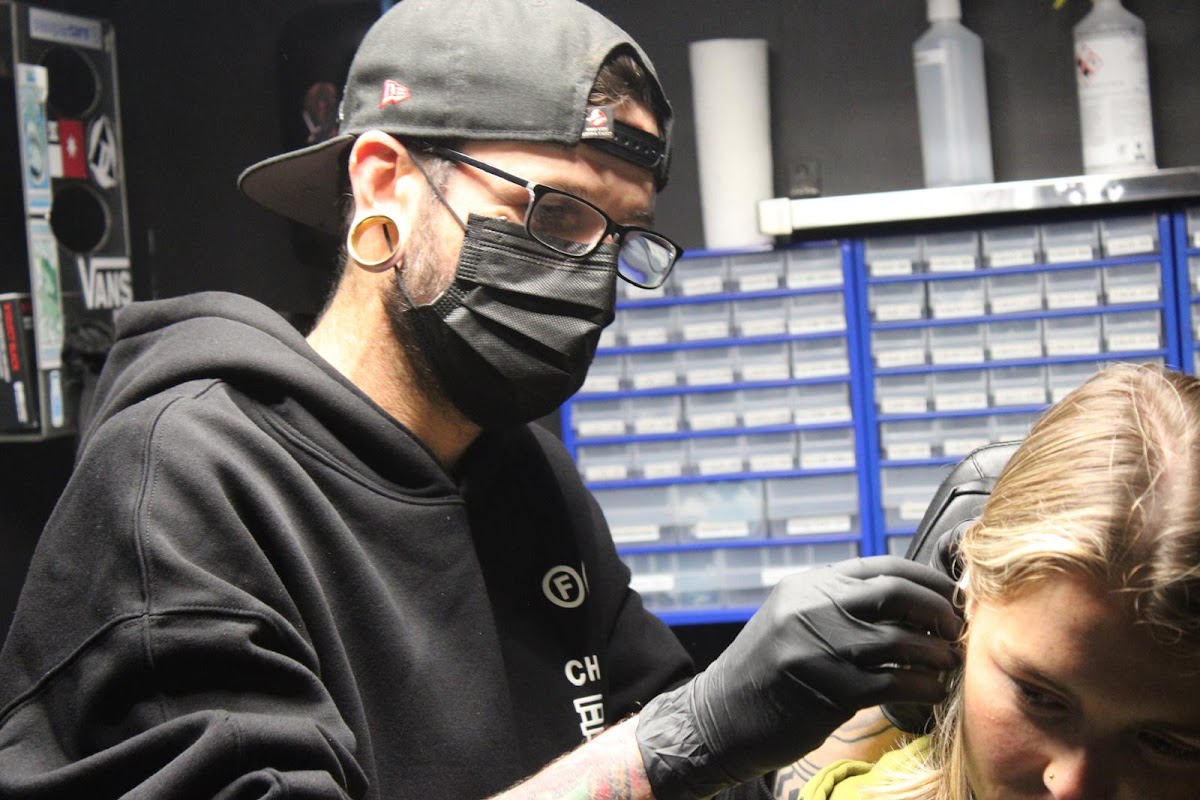 Impulse BioWorks & Piercing tattoo work 6
