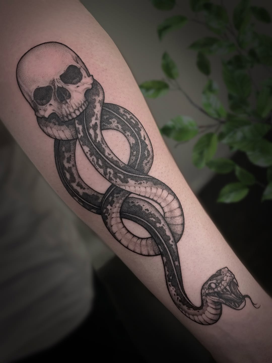 The client came in the shop with a really cool idea of a death eater (Harry Potter) tattoo on his forearm, so he got a reference and everything. I was soooo excited cause it’s one of my favorite books of all times so I jumped into it! Even tho he had the reference that looked almost exactly the same