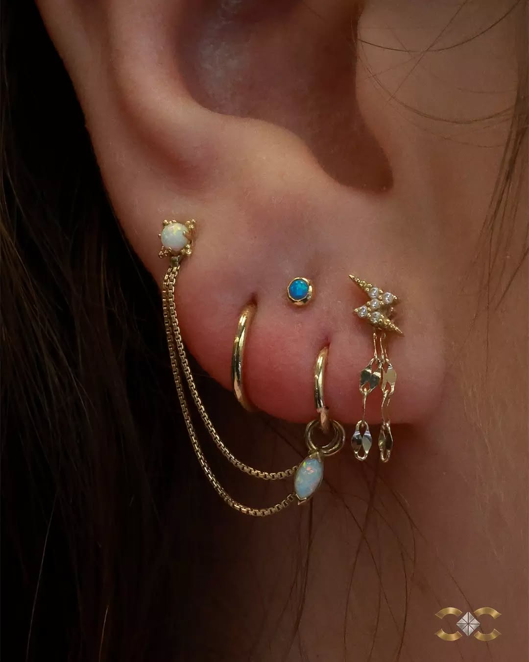Gold hoops, opals, and delicate chains working together in this lobe stack.
A lobe composition full of movement and tiny details.

#EarCuration #FineJewellery #PiercingDublin #PiercerCharliesCreations

Find Ireland's largest collection of Fine Jewellery in-store at 7 D'Olier Street or online at our 